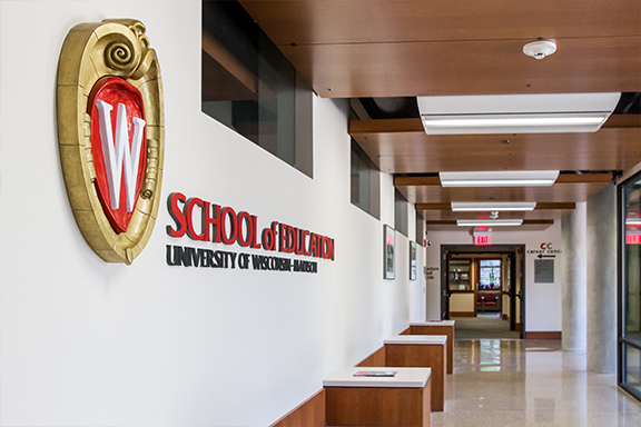 Hallway with sign saying UW-Madison School of Education.