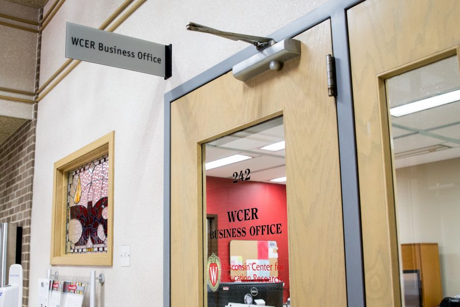 Sign above and on door reads, "WCER Business Office".