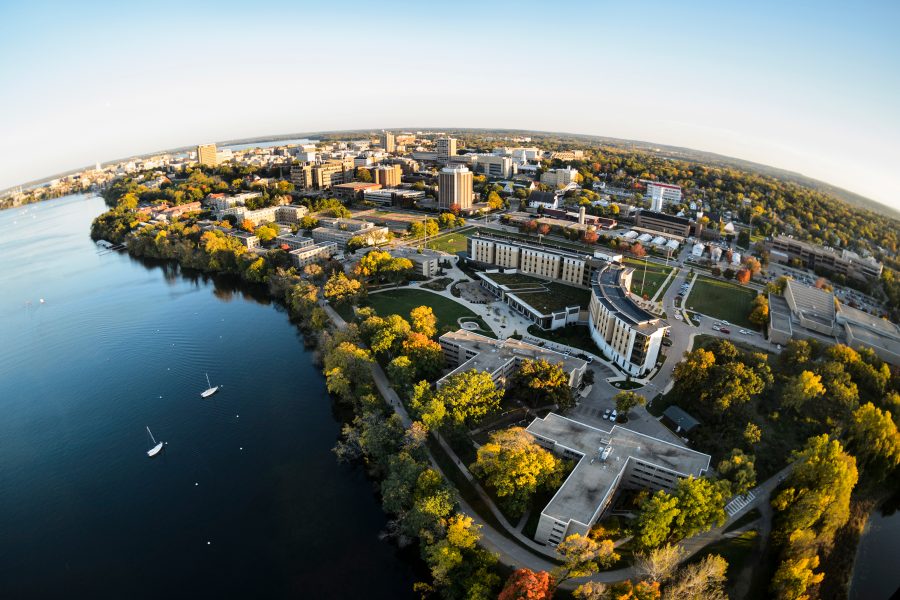 An overview of the city of Madison; overlooking trees, buildings and the lake.