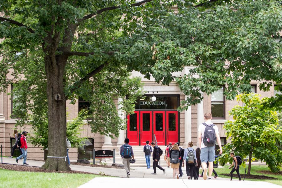 Students walking into the Education Building.