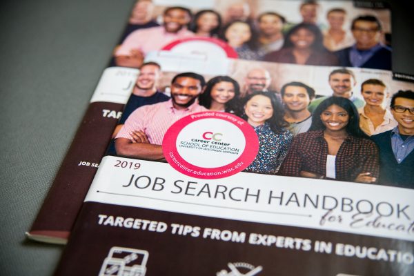 2019 job search handbook with a Career Center sticker on the cover.