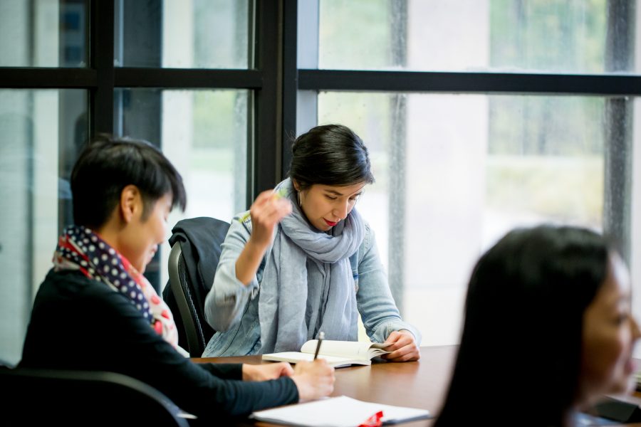 Associate Professor Counseling Psychology mindi thompson meets with her research team of UW students.