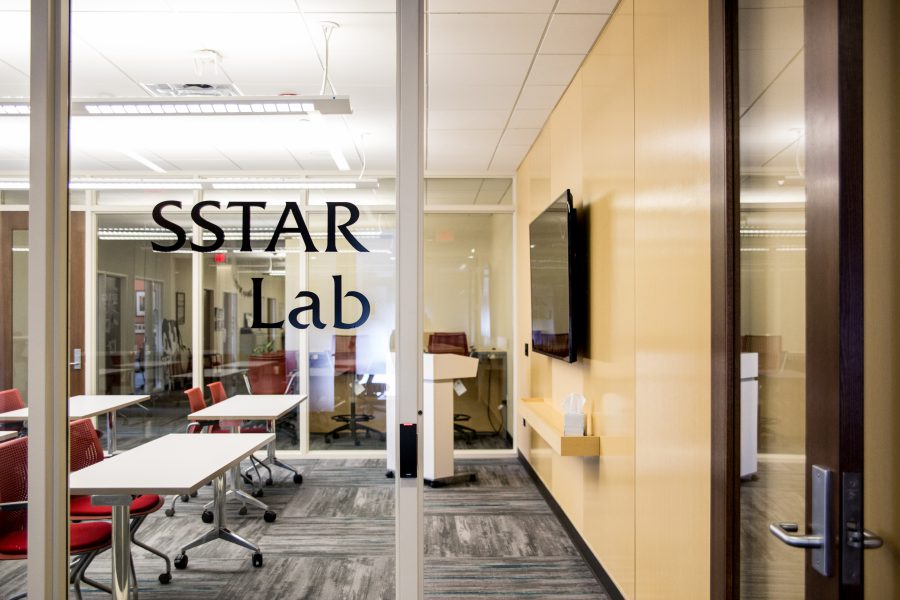 SSTAR Lab logo on a window to a classroom