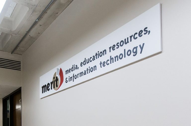 Merit sign mounted on a wall