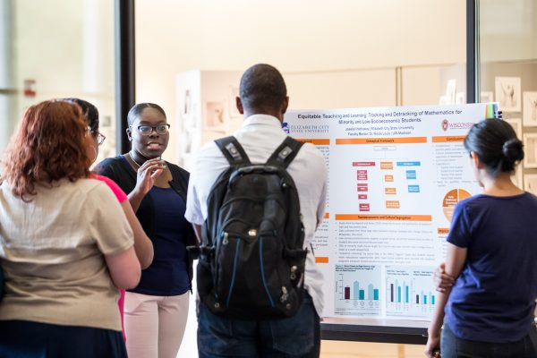 SERP Scholars present their final project.
